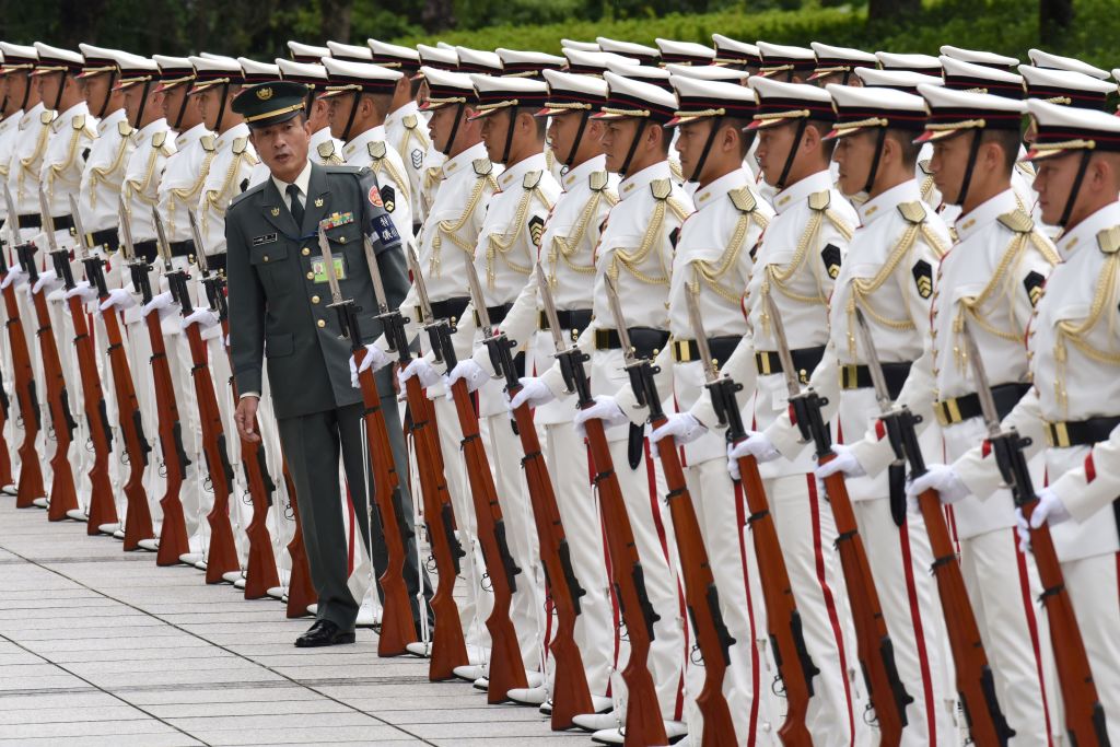 Japan Self-Defence Force honour guards make a line prior to a welcoming ceremony for Japan's Prime Minister Shinzo Abe. Japan Self-Defence Force honour guards make a line prior to a welcoming ceremony for Japan's Prime Minister Shinzo Abe.