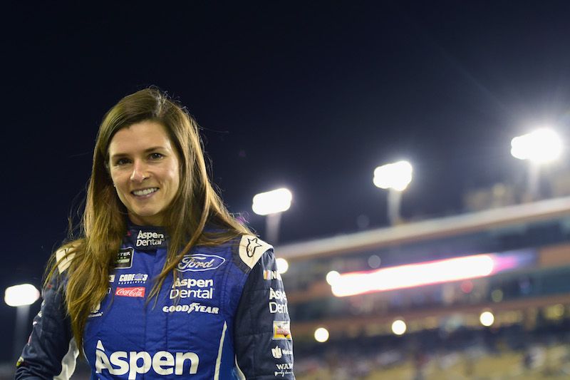 Danica Patrick, driver of the #10 Aspen Dental Ford, stands on the grid during qualifying for the Monster Energy NASCAR Cup Series Championship Ford EcoBoost 400 at Homestead-Miami Speedway on November 17, 2017 in Homestead, Florida
