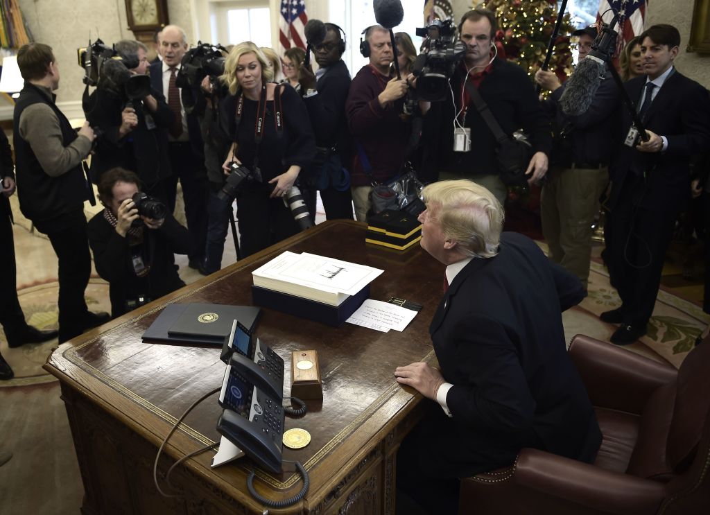 trump surrounded by TV and still cameras trump surrounded by TV and still cameras
