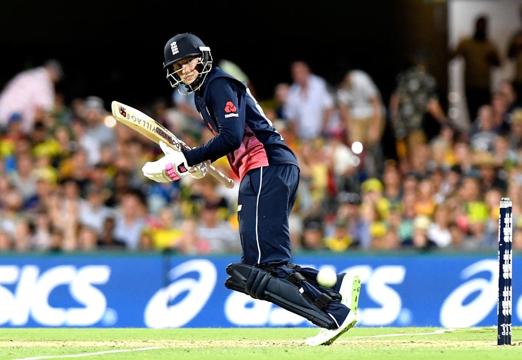Cricket player plays a shot