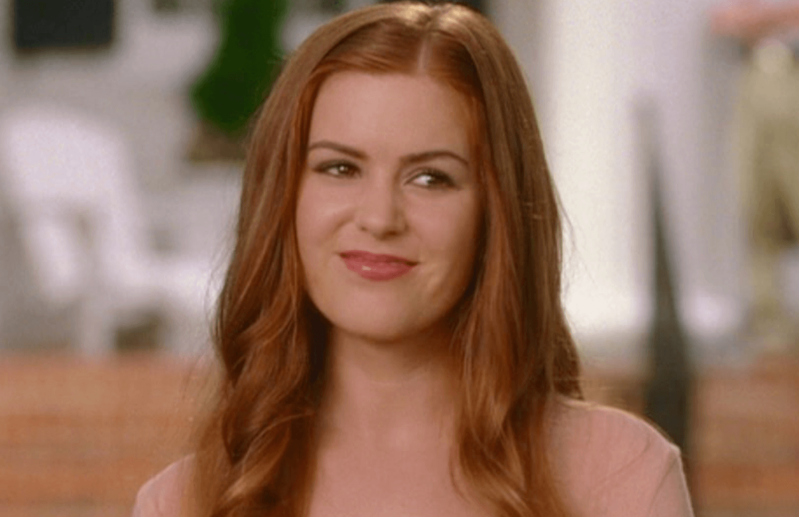 Isla Fischer smiles and looks straight ahead in 'Wedding Crashers'. Isla Fischer smiles and looks straight ahead in 'Wedding Crashers'.