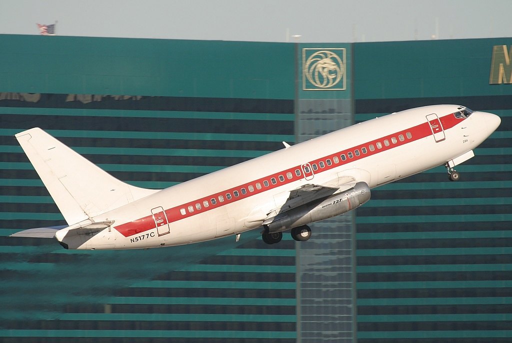 White plane with red stripe and no other markings