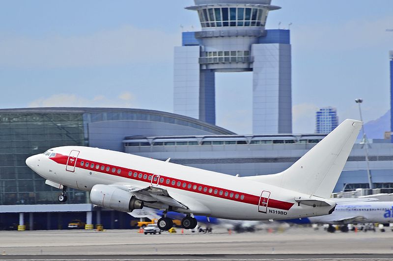 White plane with red stripe and no other markings