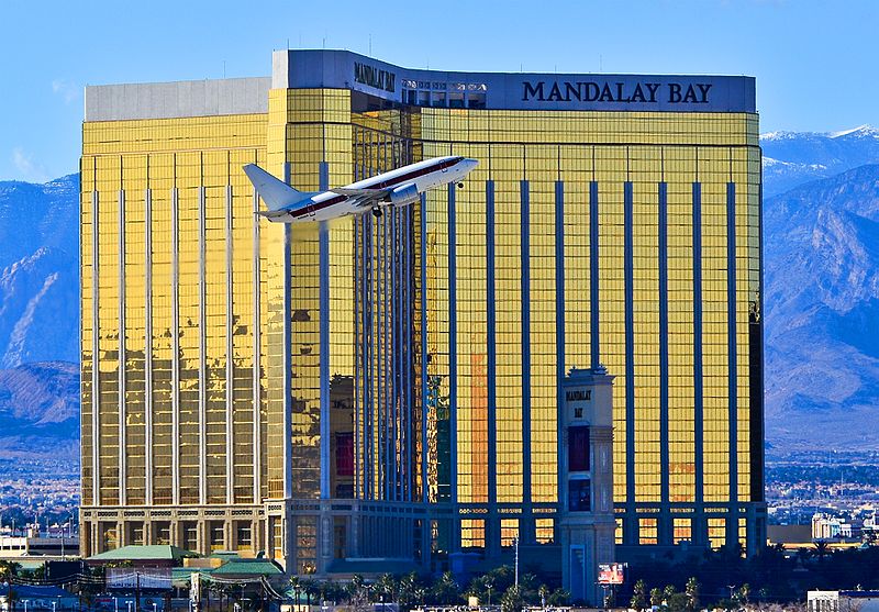 JANET airplane flying in front of Mandalay Bay hotel