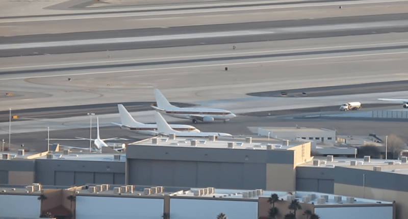 White plane with red stripe and no other markings