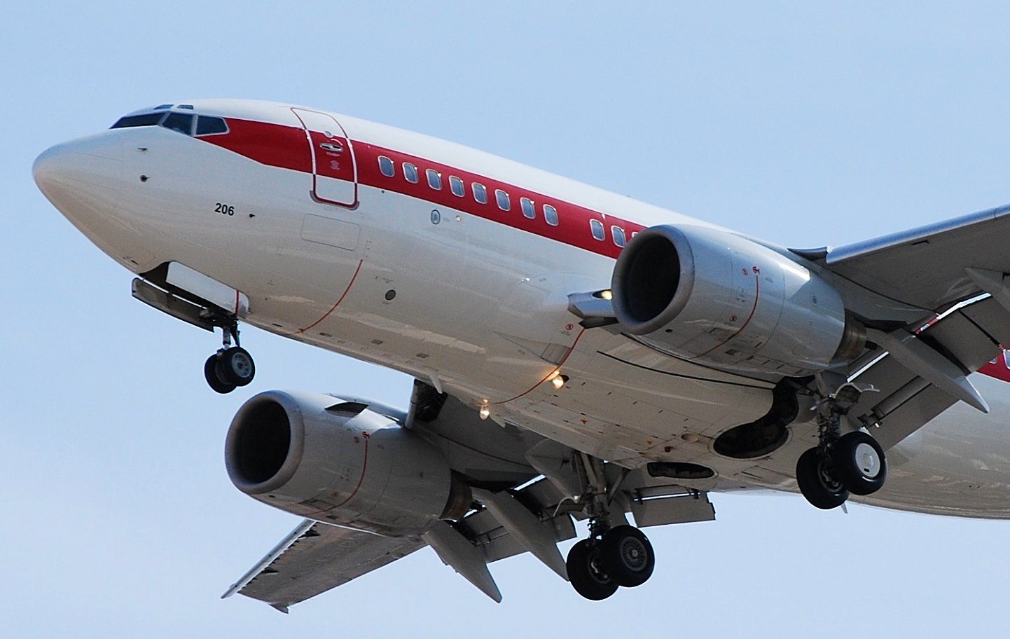 White plane with red stripe and no other markings