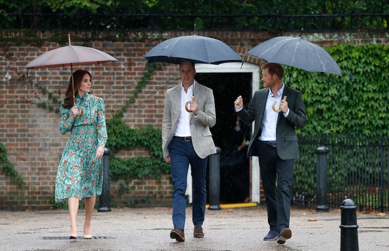 Catherine, Duchess of Cambridge, Prince William, Duke of Cambridge and Prince Harry are seen during a visit to The Sunken Garden at Kensington Palace Catherine, Duchess of Cambridge, Prince William, Duke of Cambridge and Prince Harry are seen during a visit to The Sunken Garden at Kensington Palace