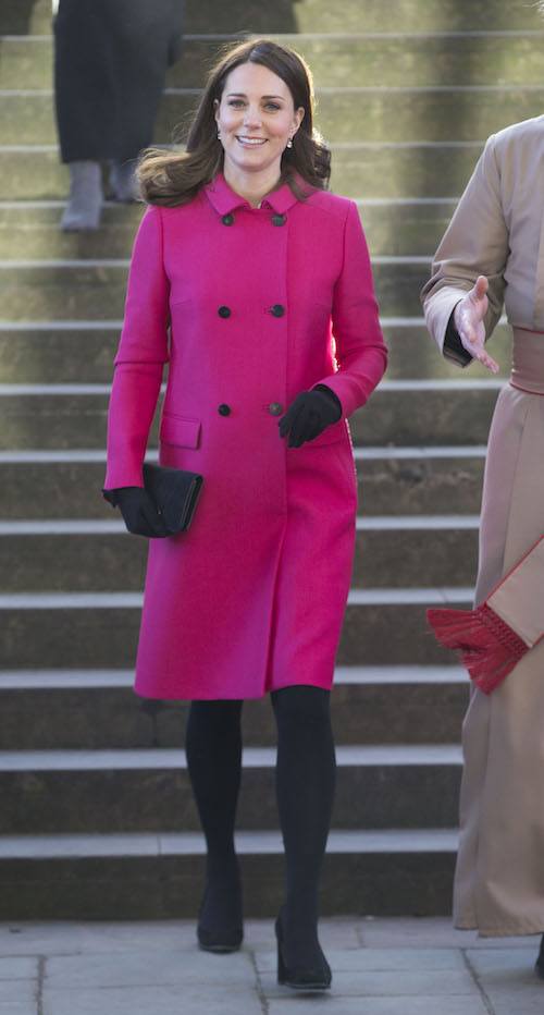 Kate Middleton walking in a pink coat. Kate Middleton walking in a pink coat.