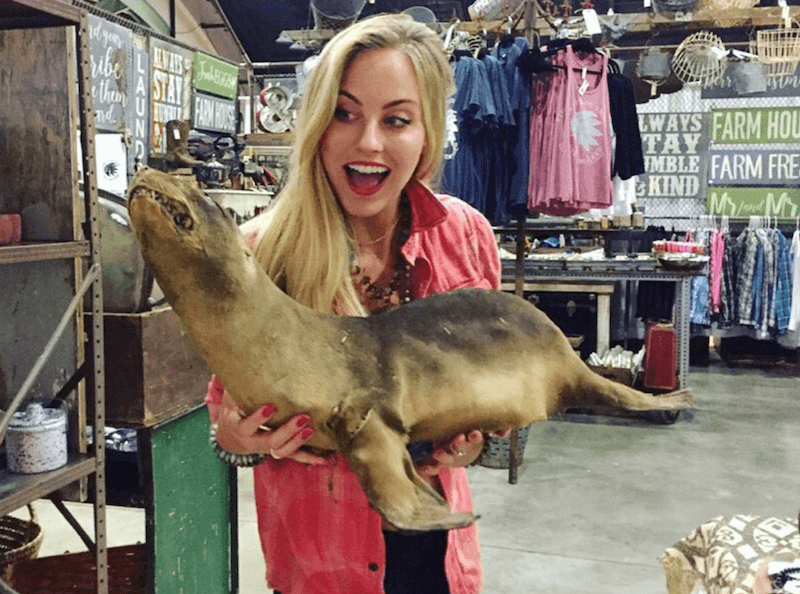Kendall Long holding a taxidermy seal. 