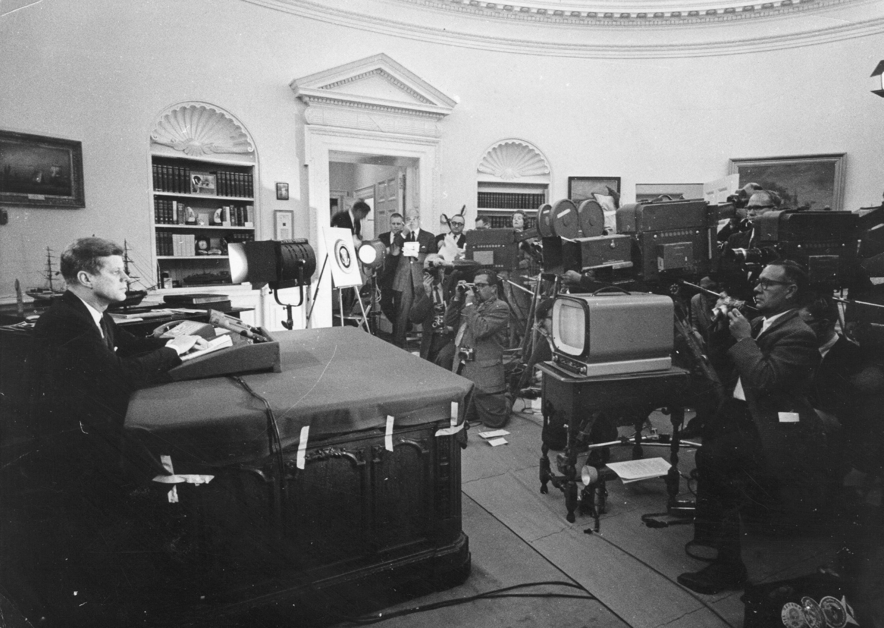John F. Kennedy In the oval office with TV Cameras