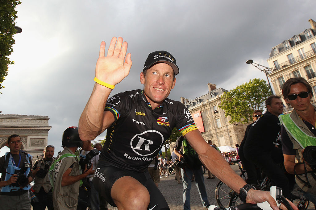 Le Tour 2010 - Stage Twenty Lance Armstrong of team Radioshack waves to fans after the twentieth and final stage of Le Tour de France