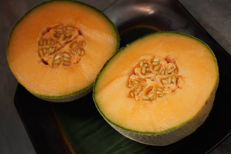 Cantaloupe is seen sliced open