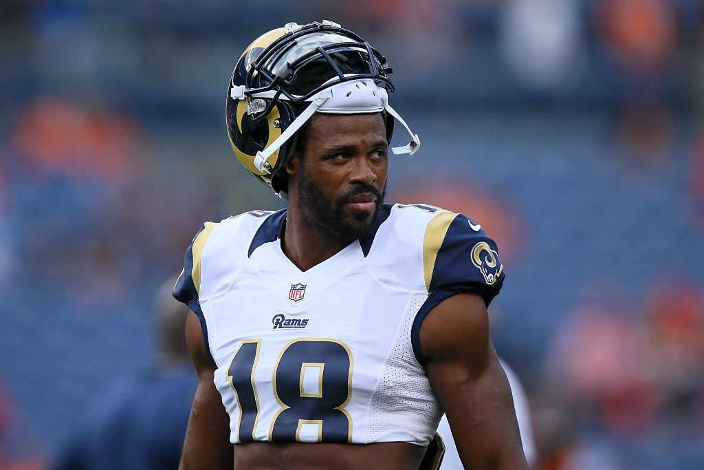 Wide receiver Kenny Britt #18 of the Los Angeles Rams looks on before a game against the Denver Broncos