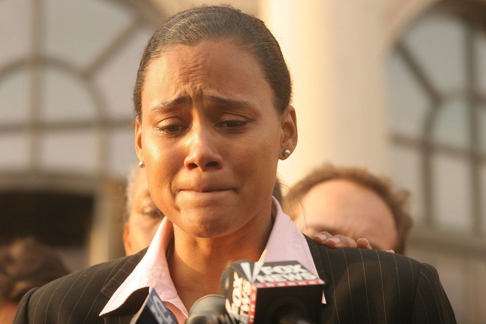 Three-time Olympic gold medalist Marion Jones speaks to the media outside a United States federal courthouse
