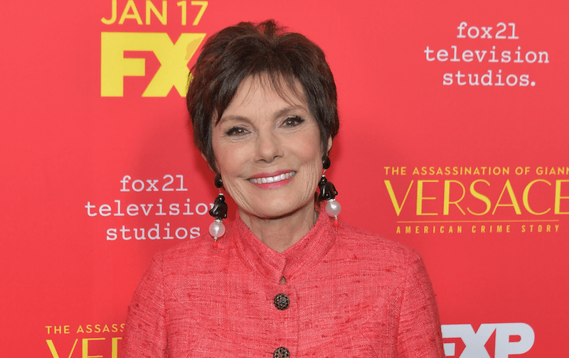 Maureen Orth posing on a red carpet. Maureen Orth posing on a red carpet.