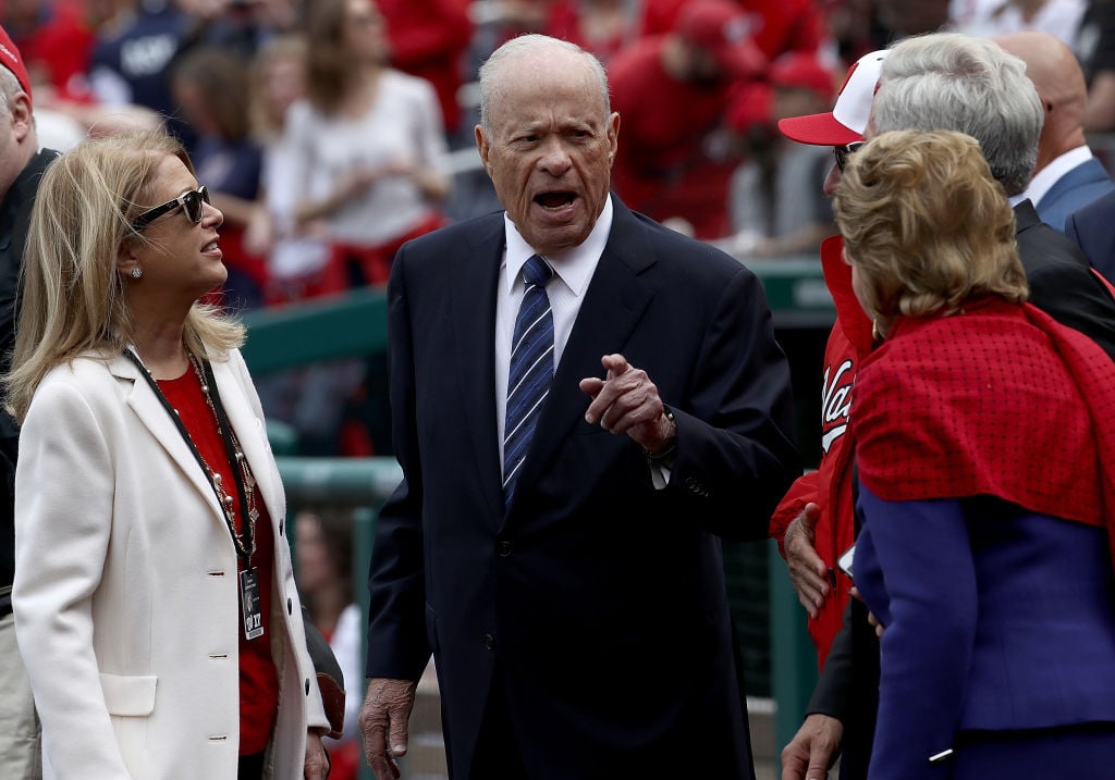 Washington Nationals owner Ted Lerner speaks with family members before the start of the Opening Day game