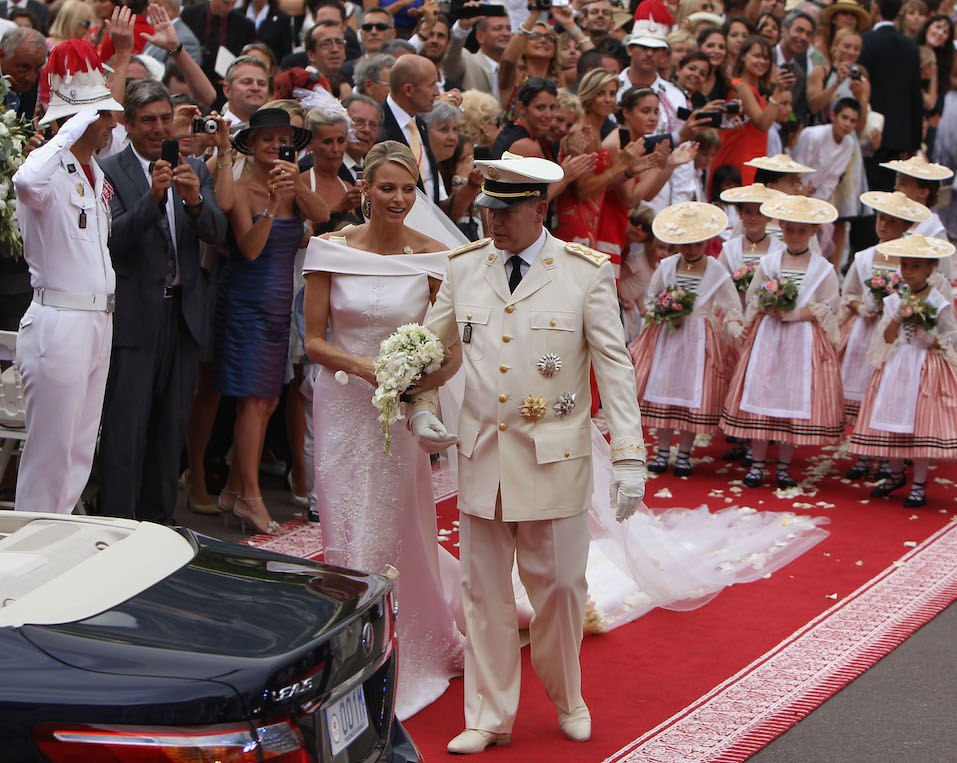Princess Charlene of Monaco and Prince Albert II of Monaco make their journey to Sainte Devote church Princess Charlene of Monaco and Prince Albert II of Monaco make their journey to Sainte Devote church
