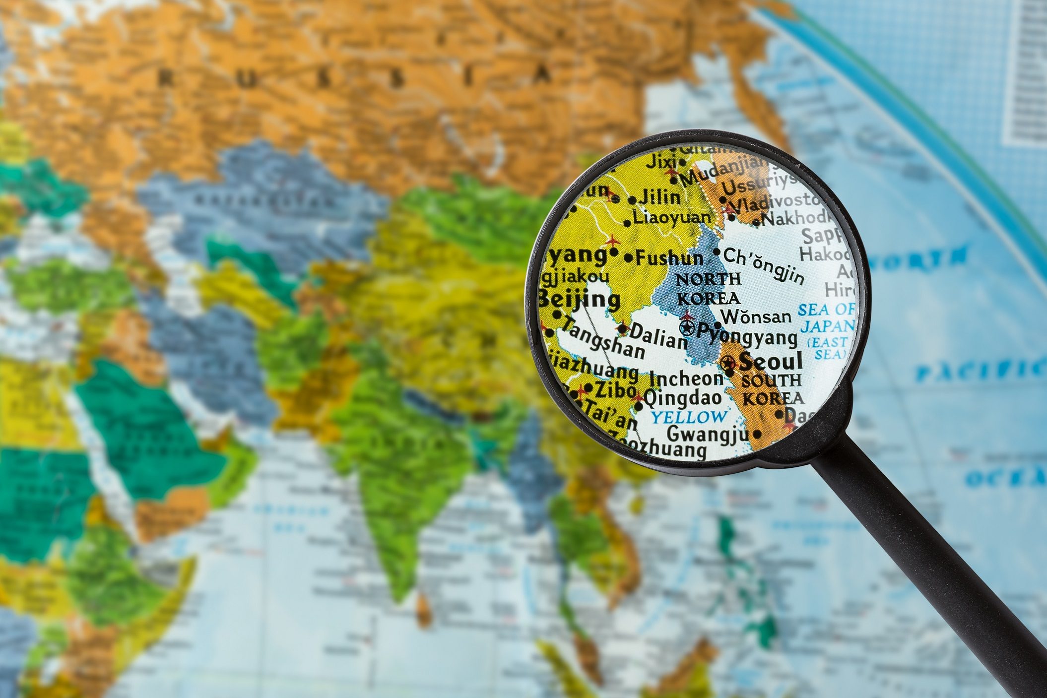 Map of North Korea through magnifying glass