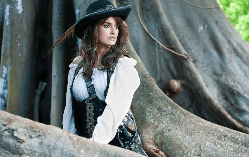 Penelope Cruz standing in front of a large tree in 'On Stranger Tides'. Penelope Cruz standing in front of a large tree in 'On Stranger Tides'.