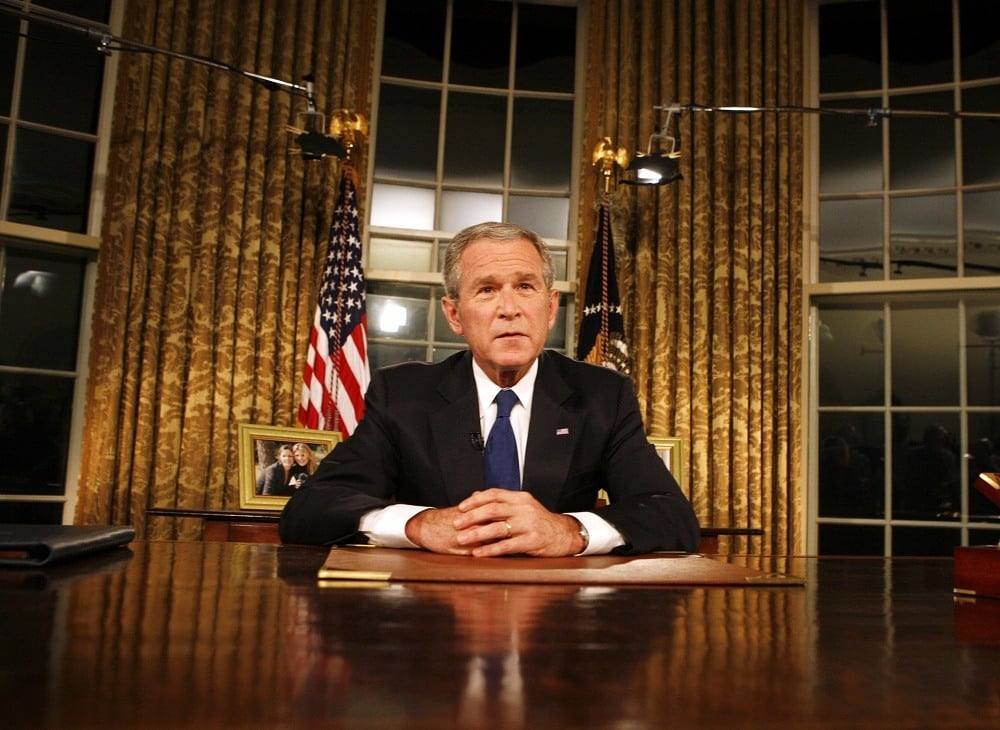 President George W. Bush poses for photographers
