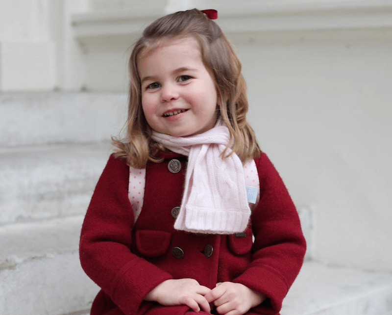 Princess Charlotte sitting on a staircase. Princess Charlotte sitting on a staircase.