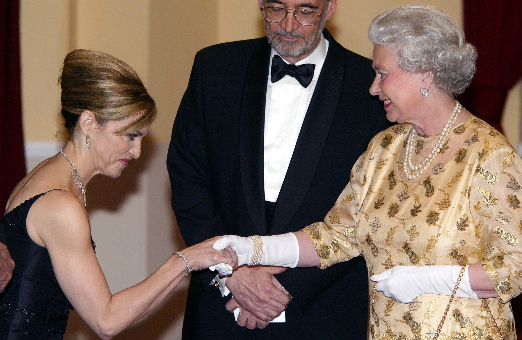 Queen Elizabeth II meets US pop star and actress Madonna Queen Elizabeth II meets US pop star and actress Madonna