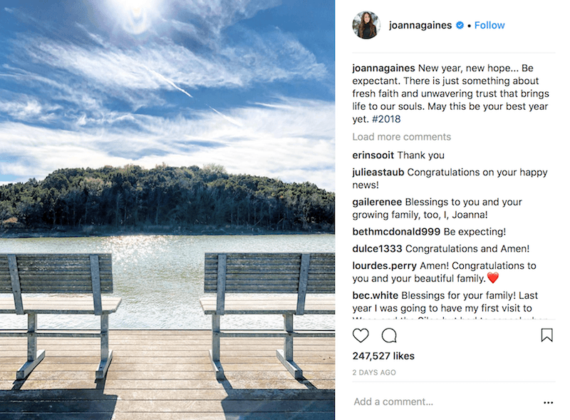 A screenshot of Joanna Gaines Instagram picture showing two benches on a dock in front of water