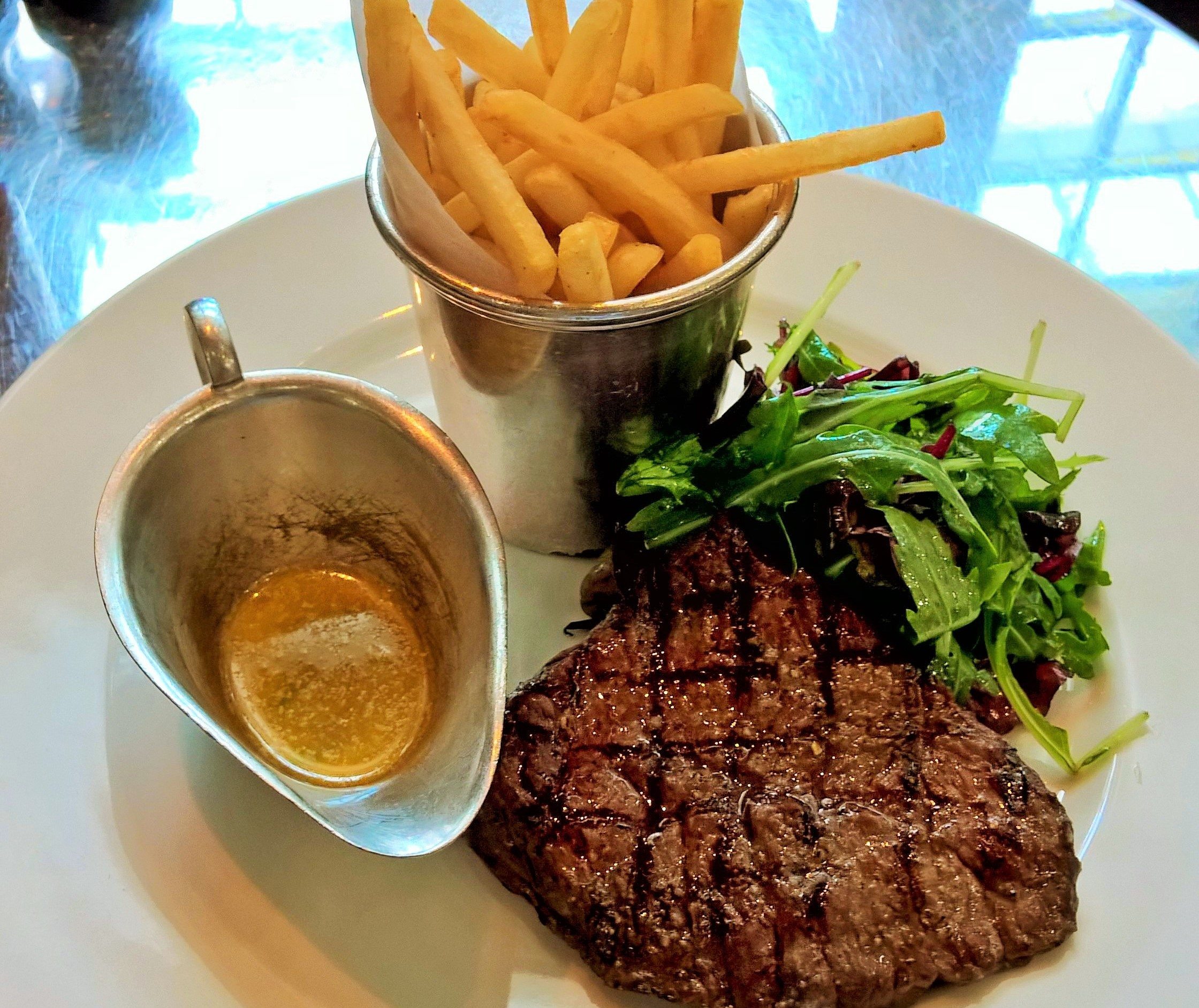 Classic French dish of thin cut steak and fries