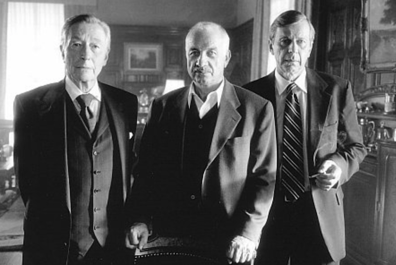 Armin Mueller-Stahl, William B. Davis, and John Neville in 'The X Files'.
