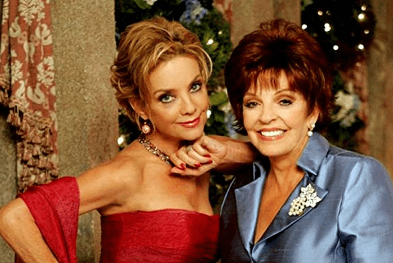 Two characters posing together in 'The Young and The Restless'. 