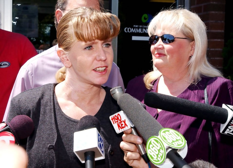 Former Olympic figure skater Tonya Harding speaks to reporters about her sentencing