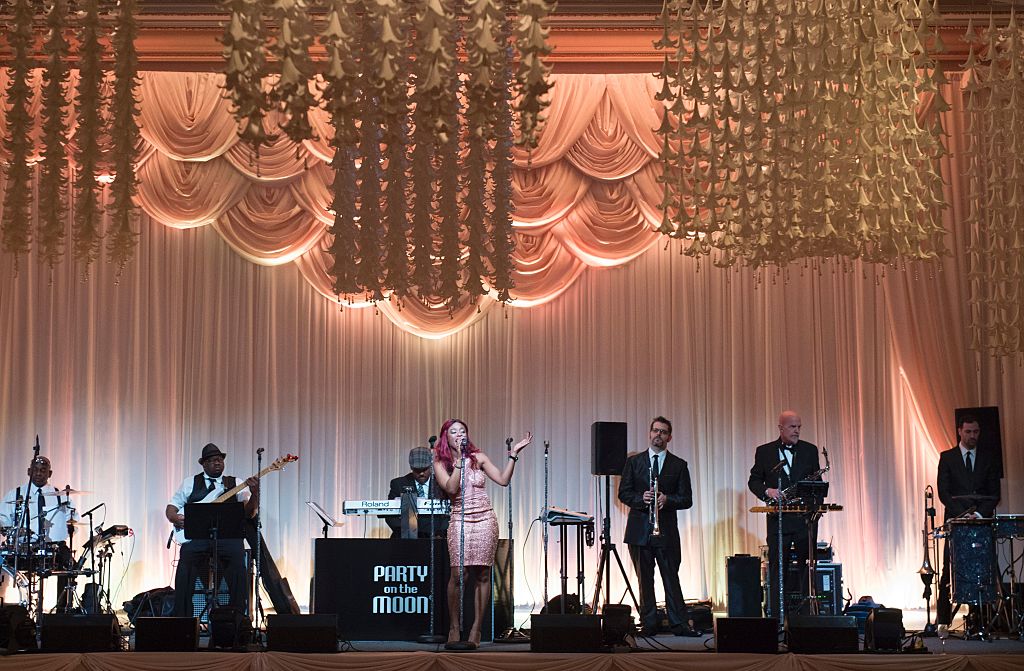 Party on the Moon performs during US President-elect Donald Trump's New Year's Eve