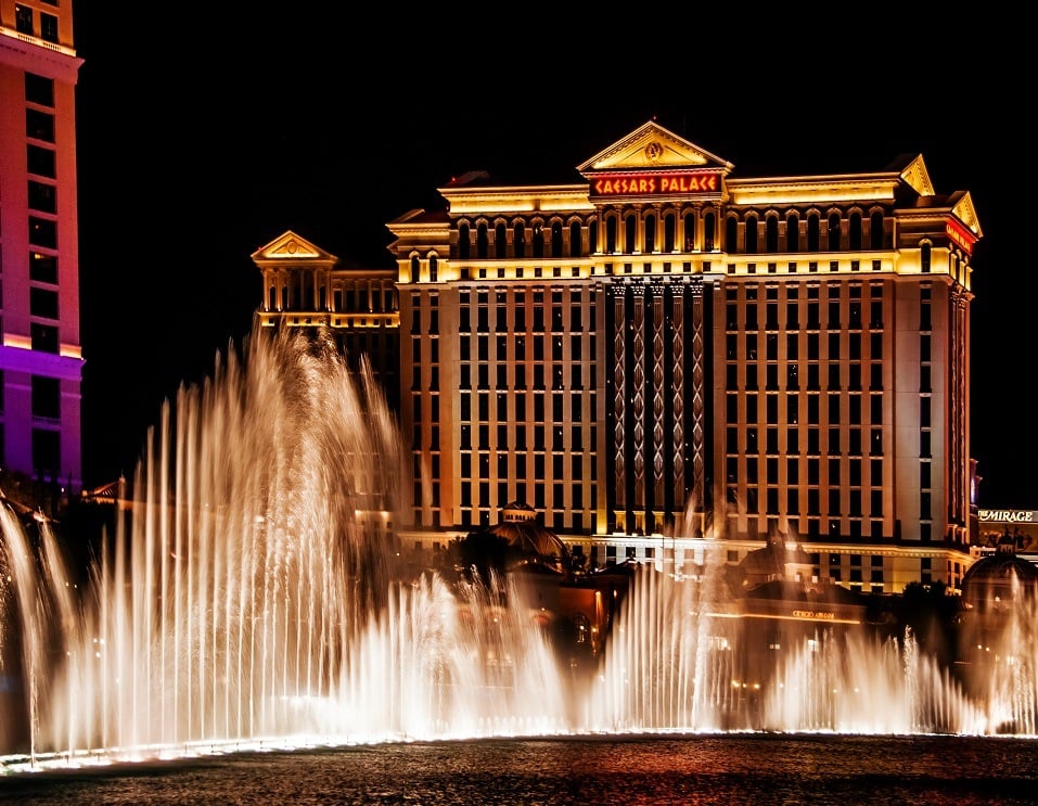 The Caesars Palace Hotel is shown behind some of the fountains of the Bellagio Hotel