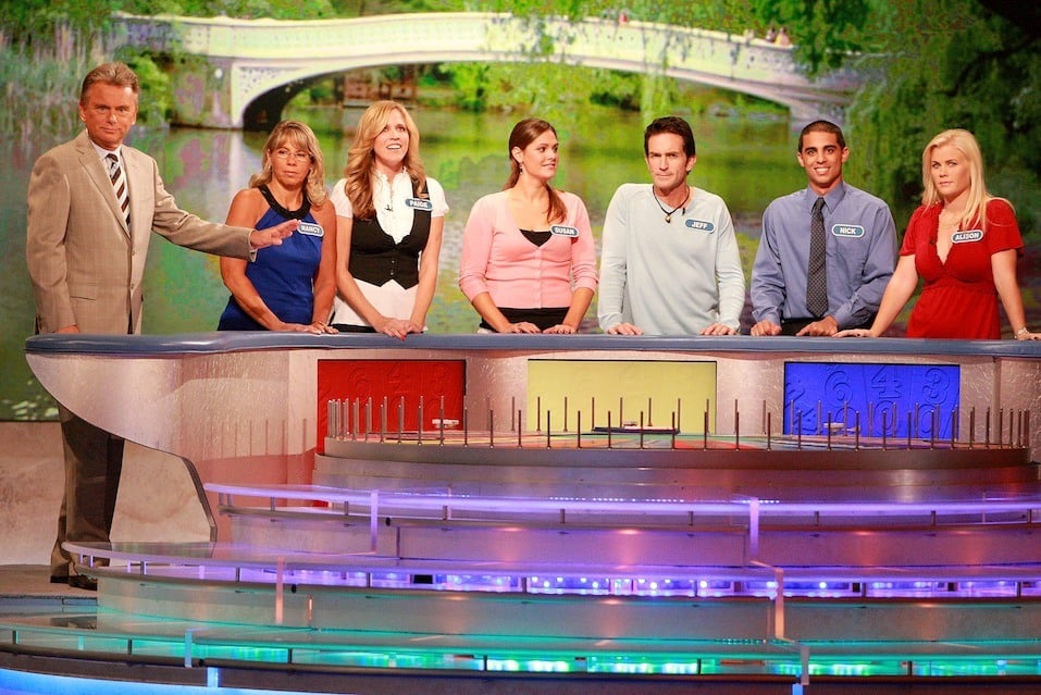 Host Pat Sajak greets Nancy Kaufman, actress Paige Hemmis, Susan Moran, actor Jeff Probst, Nick Giovine and actress Alison Sweeney during a taping of "Wheel Of Fortune Celebrity Week"