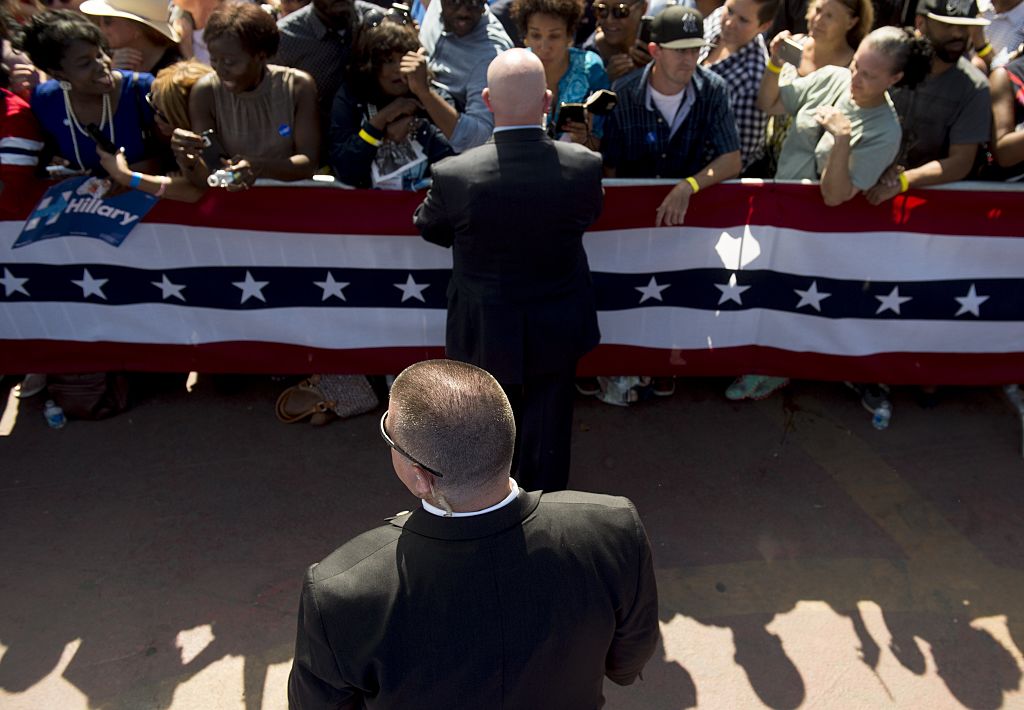 A Secret Service Agent stands watch as US President Barack Obama