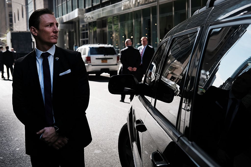 A secret Service agent stands guard outside of Trump Tower
