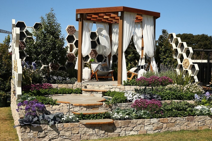 A gazebo and garden is seen on display