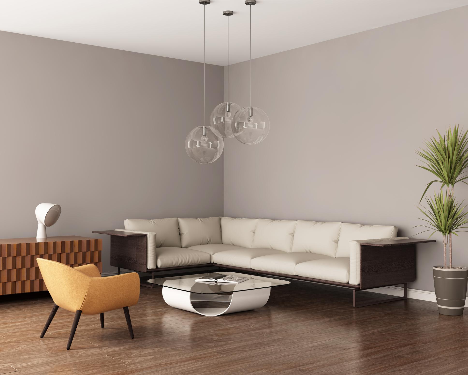 Grey living room with a leather sofa and bamboo flooring
