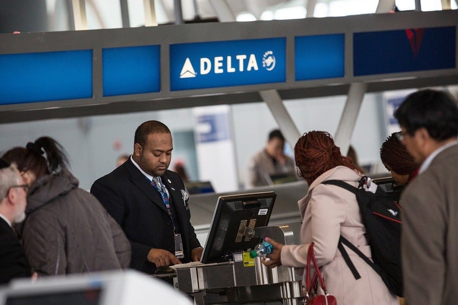 Customers check in at Delta's counter