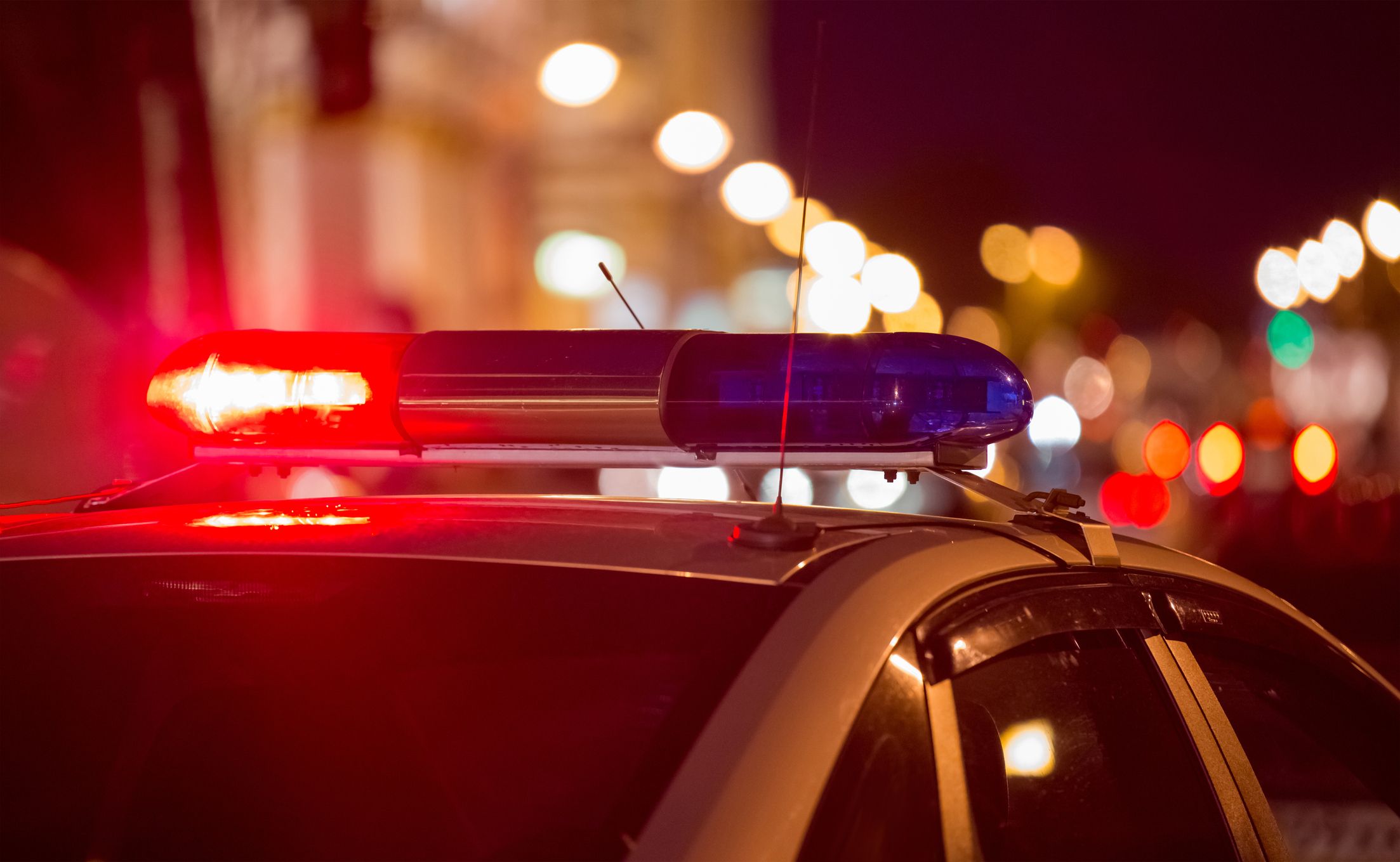 Red light flasher atop of a police car Red light flasher atop of a police car