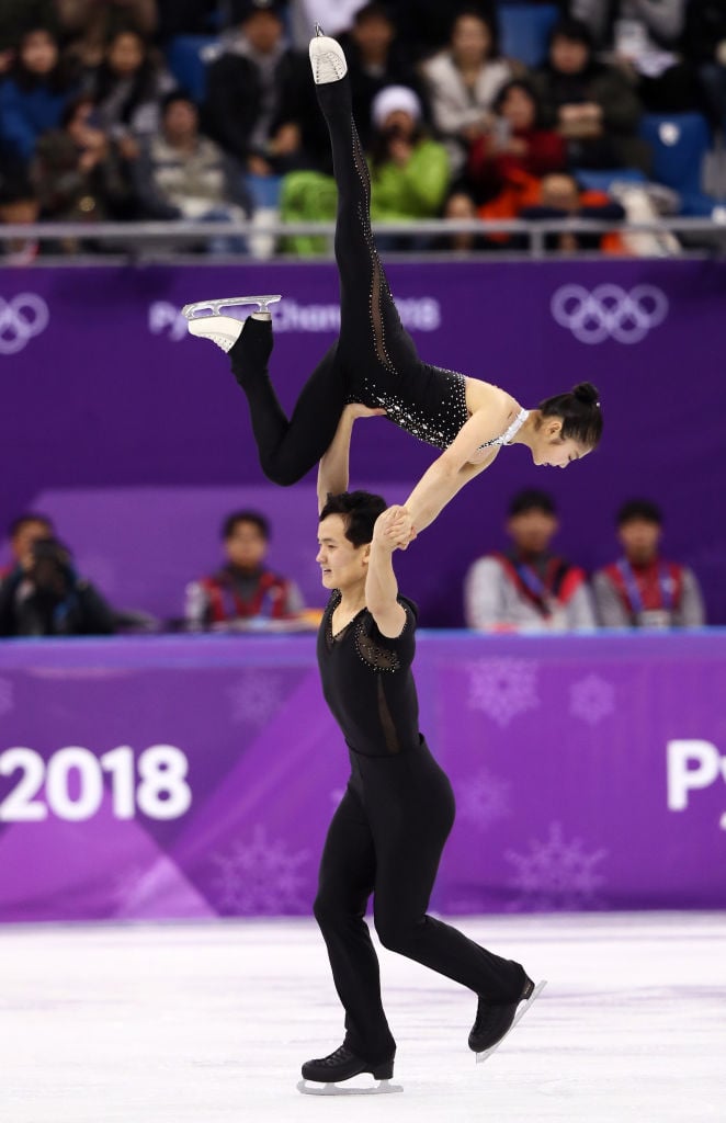 Tae Ok Ryom and Ju Sik Kim of North Korea compete during the Pair Skating Free Skating