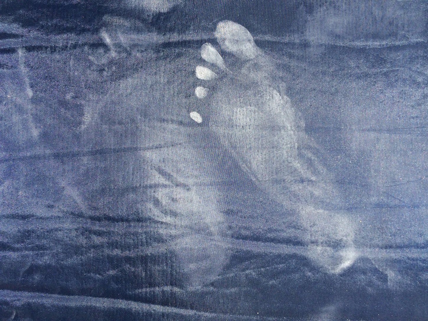Dusty footprint on textile background