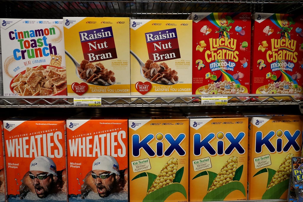 Boxes of General Mills brand cereals are displayed at Scotty's Market