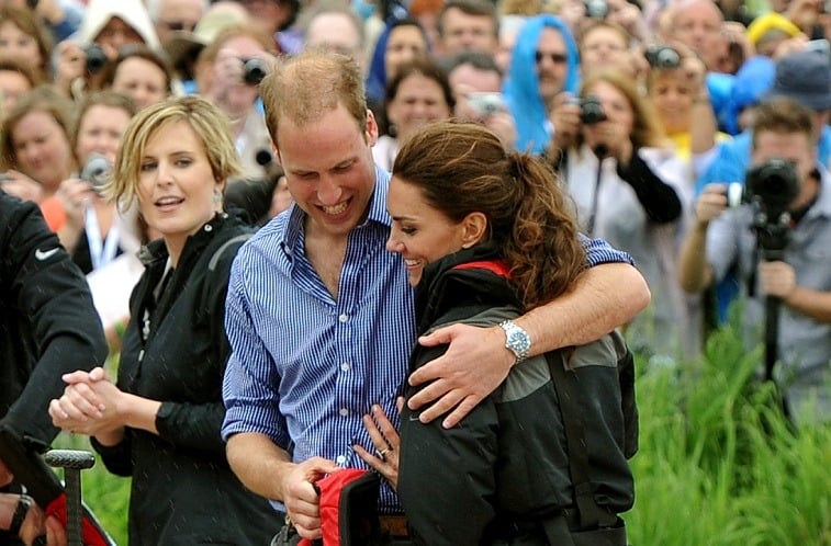 Prince William, Duke of Cambridge hugs his wife Catherine, Duchess of Cambridge .
