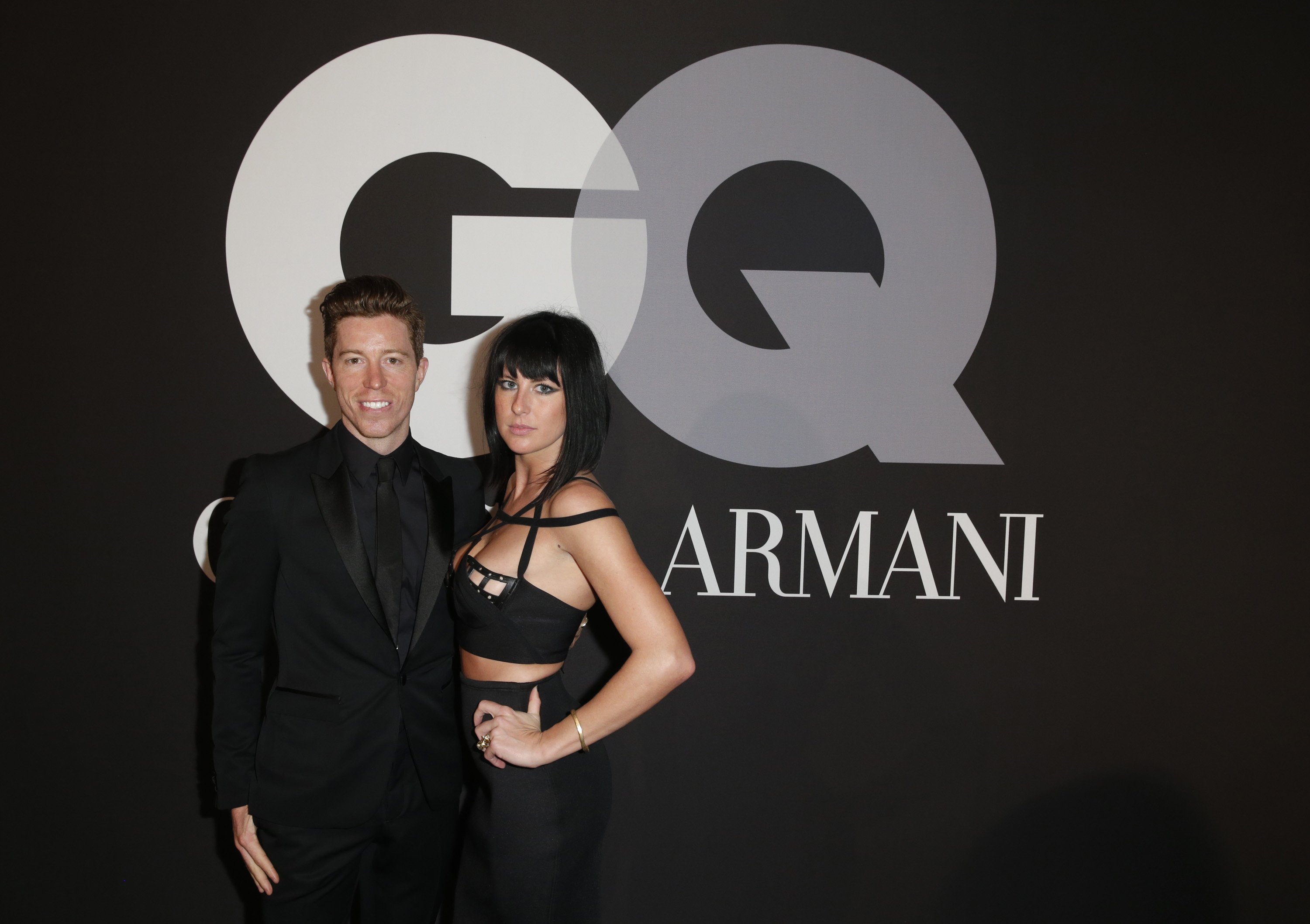 Professional snowboarder Shaun White (L) and recording artist Sarah Barthel of music group Phantogram attend GQ and Giorgio Armani Grammys After Party at Hollywood Athletic Club 