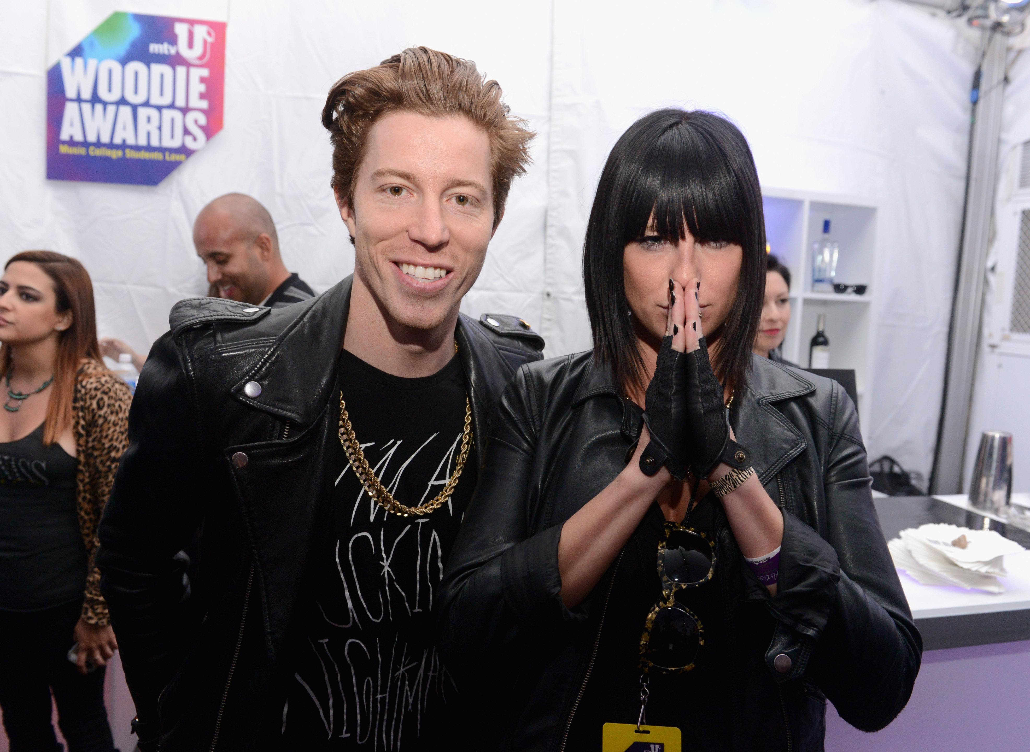 Snowboarder Shaun White (L) and musician Sarah Barthel, of Phantogram, attend the 2014 mtvU Woodie Awards and Festival on March 13, 2014 in Austin, Texas. 