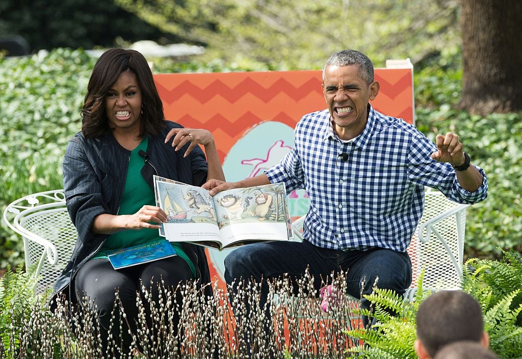 US President Barack Obama and First Lady Michelle Obama read Maurice Sendak's "Where the Wild Things Are" to children at the annual Easter Egg Roll at the White House