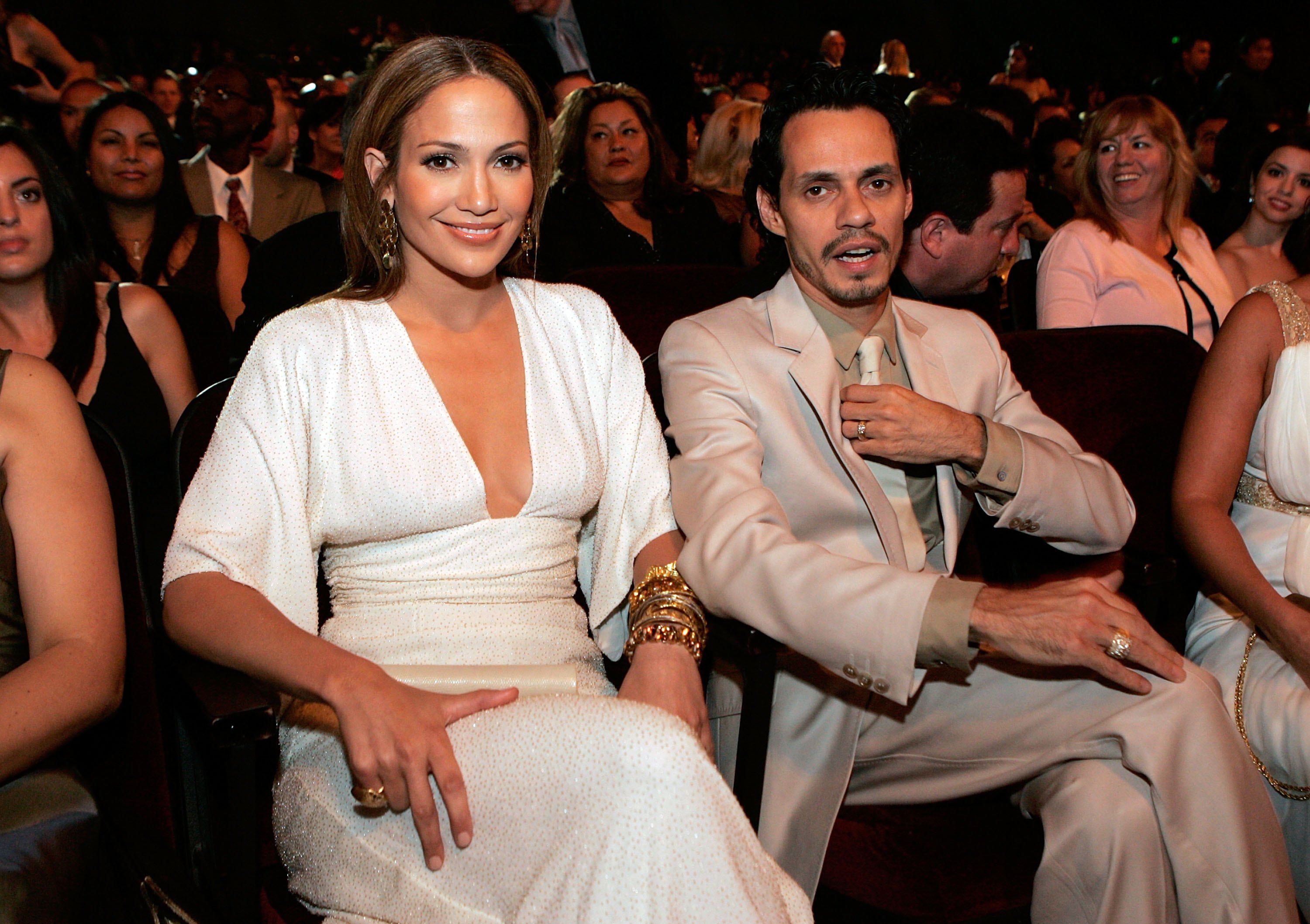Actress/Singer Jennifer Lopez (L) and Marc Anthony in the audience at the 2006 NCLR ALMA Awards at the Shrine Auditorium on May 7, 2006 in Los Angeles, California.