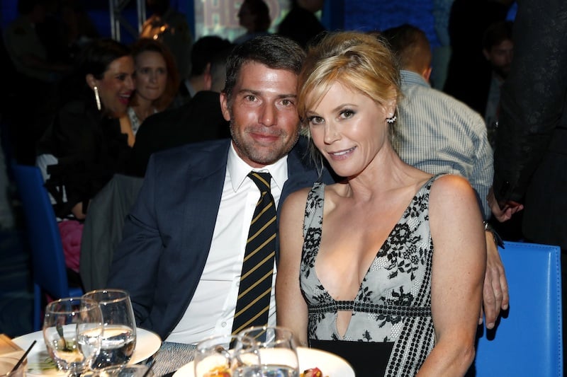 Scott Phillips sits with Julie Bowen at an awards dinner. Scott Phillips sits with Julie Bowen at an awards dinner.