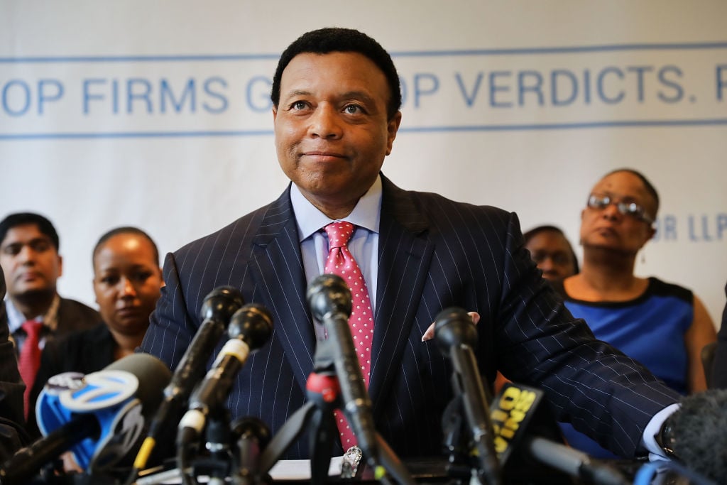 Fox News anchor Kelly Wright speaks to the media as he joins other current and former Fox employees at a press conference organized by his attorney Doug Wigdor of Wigdor LLP on April 26, 2017 in New York City. Wright, and ten other plaintiffs, filed an amended lawsuit in New York state court in which they claim that they faced years of racial discrimination at Fox.